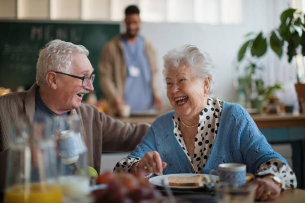older dining couple